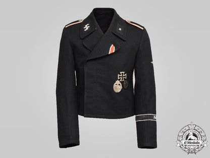 germany,_ss._the_uniform,_accessories,_and_decorations_of_an_unterscharführer_of_the9_th_ss_panzer_division_hohenstaufen_c2021_389emd_3635_1