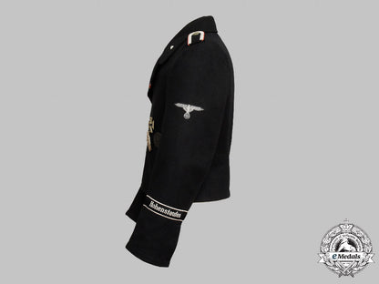 germany,_ss._the_uniform,_accessories,_and_decorations_of_an_unterscharführer_of_the9_th_ss_panzer_division_hohenstaufen_c2021_390emd_3645_1