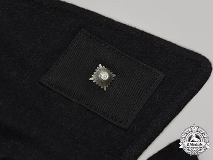 germany,_ss._the_uniform,_accessories,_and_decorations_of_an_unterscharführer_of_the9_th_ss_panzer_division_hohenstaufen_c2021_397emd_3685_1