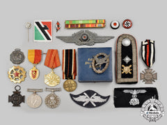International. A Lot Of Twenty Military Items