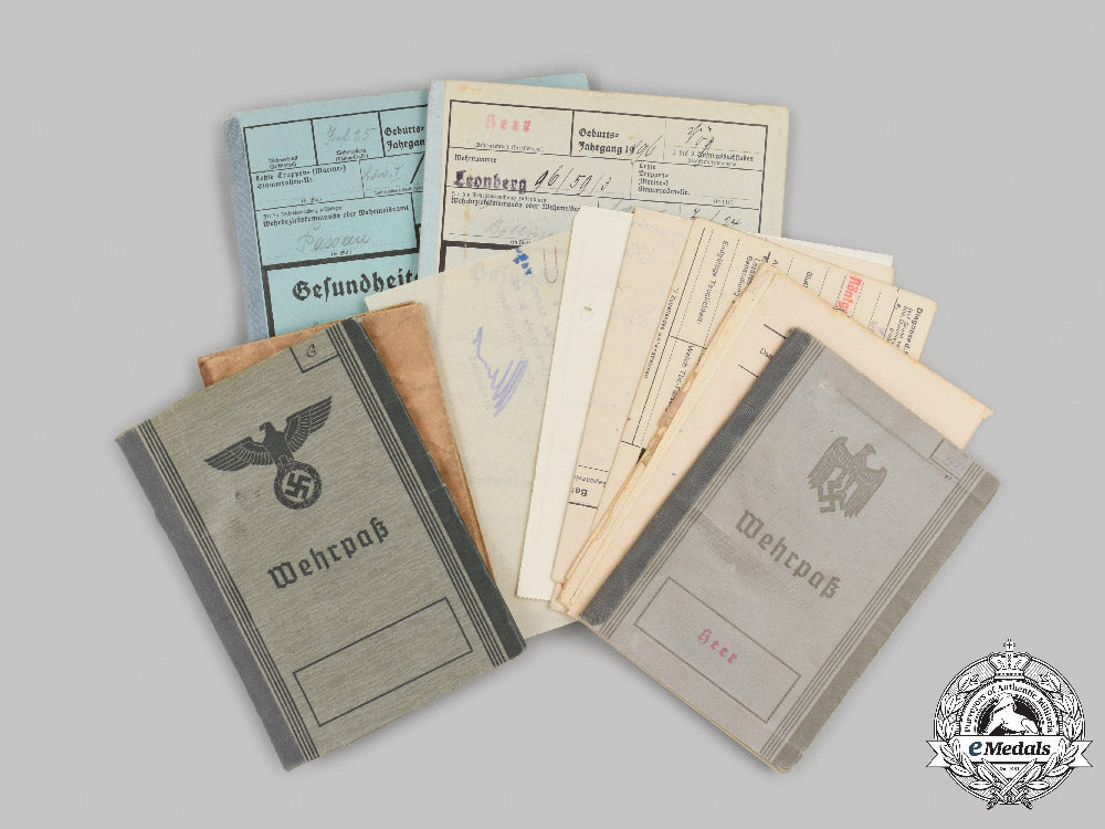 germany,_wehrmacht._a_lot_of_service_books_and_identity_documents_to_a_pair_of_soldiers_with_first_and_second_war_service_c2021_405emd_490