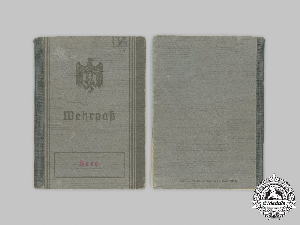 germany,_wehrmacht._a_lot_of_service_books_and_identity_documents_to_a_pair_of_soldiers_with_first_and_second_war_service_c2021_410emd_495