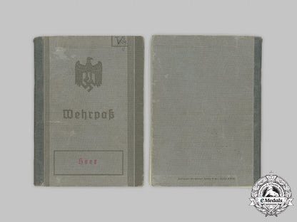 germany,_wehrmacht._a_lot_of_service_books_and_identity_documents_to_a_pair_of_soldiers_with_first_and_second_war_service_c2021_410emd_495