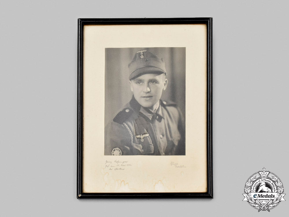 germany,_heer._a_framed_wartime_portrait_of_a_gebirgsjäger_kia_at_the_second_battle_of_kharkov_c2021_461_mnc0056