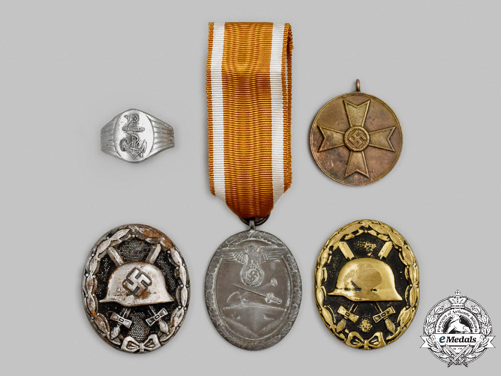 germany,_wehrmacht._a_mixed_lot_of_decorations_c2021_541_mnc7739_1