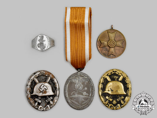 germany,_wehrmacht._a_mixed_lot_of_decorations_c2021_541_mnc7739_1