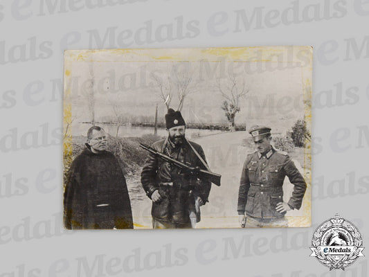 yugoslavia,_serbia._a_chetnik_soldier_with_a_catholic_priest_and_a_german_officer_photograph,_c.1943_c2021_552emd_8042_1