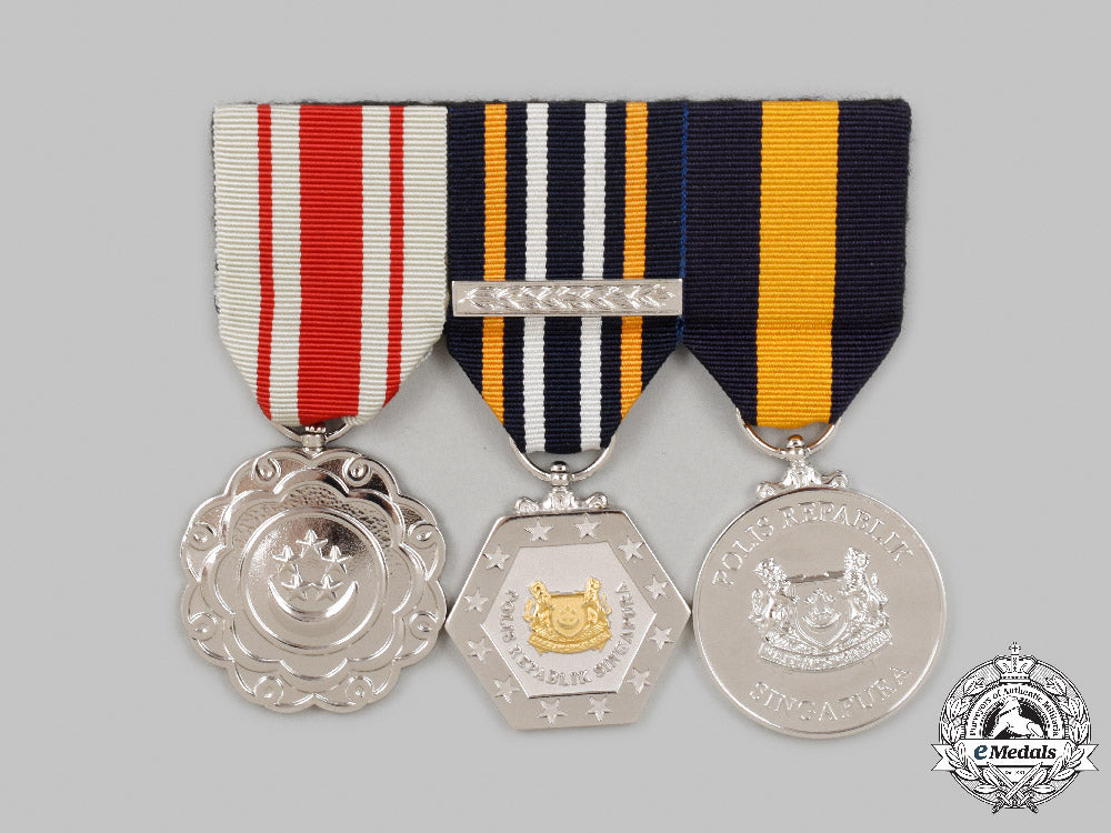 singapore,_republic._a_group_of_three_to_gurkha_police_constable,_singapore_police_force_c2021_640emd_8253