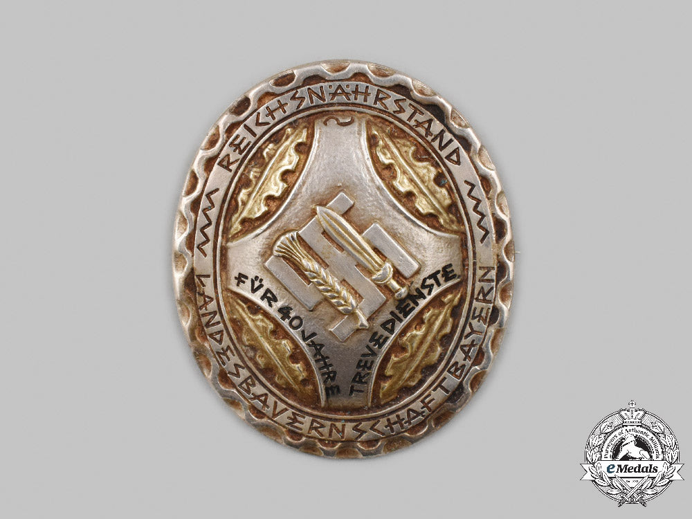 germany,_third_reich._a_reichsnährstand_bavaria40-_year_long_service_badge_in_silver,_with_case_c2021_712emd_8420