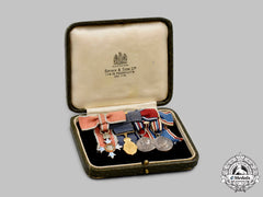 United Kingdom. A Gold Kaisar-I-Hind Meda & Ladies Obe Miniature Group