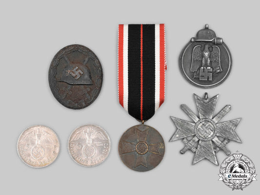 germany,_wehrmacht._a_mixed_lot_of_decorations_and_coins_c2021_847_mnc4855
