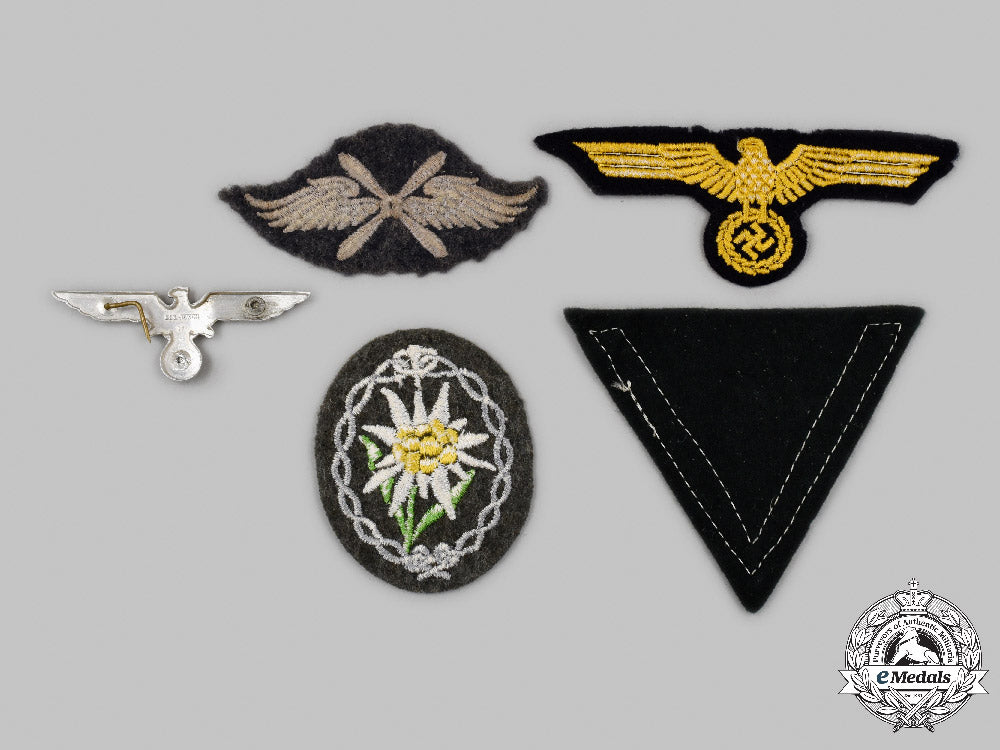 germany,_wehrmacht._a_mixed_lot_of_uniform_insignia_c2021_856emd_1910_1