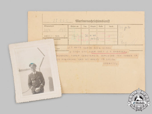 germany,_kriegsmarine._a_german_cross_in_gold_award_notice_to_friedrich_braasch,_with_recipient_photo_c2021_916emd_6437_1