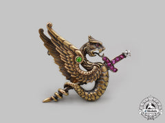 United States. A Yellow Gold, Ruby, Diamonds & Peridot Winged Dragon Brooch, By Riker Brothers, C.1900