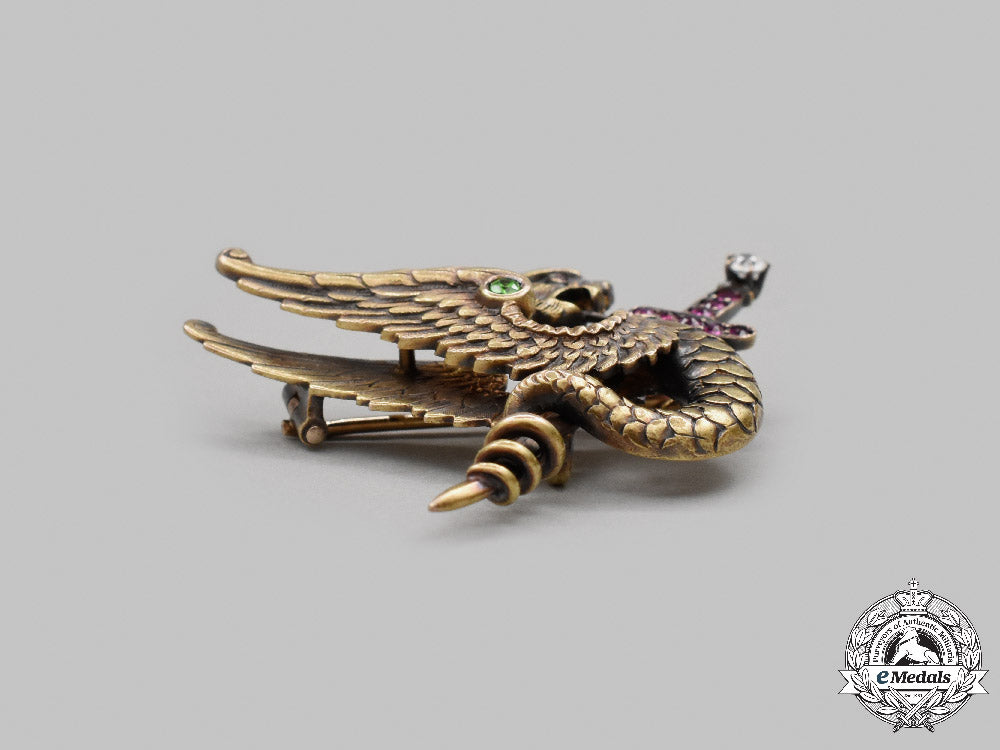 united_states._a_yellow_gold,_ruby,_diamonds&_peridot_winged_dragon_brooch,_by_riker_brothers,_c.1900_c2021_940emd_5025_1_1