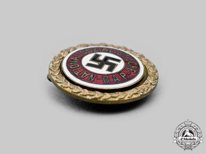 germany,_nsdap._a_golden_party_badge,_small_version,_by_josef_fuess_c20259_mnc8369_1