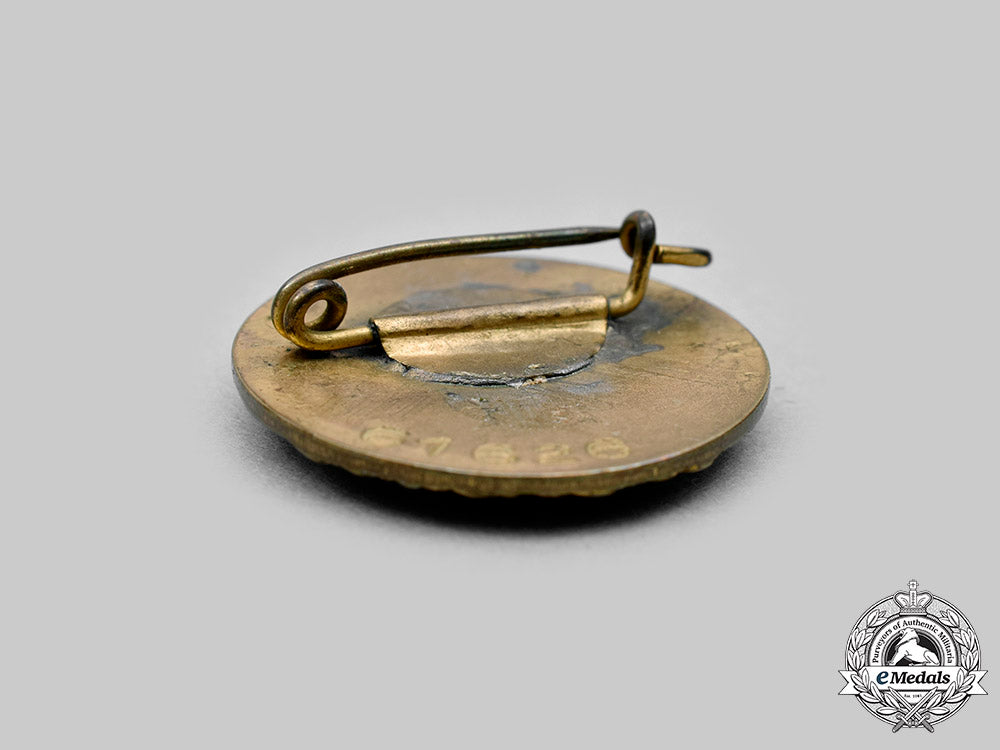germany,_nsdap._a_golden_party_badge,_small_version,_by_josef_fuess_c20260_mnc8371_1