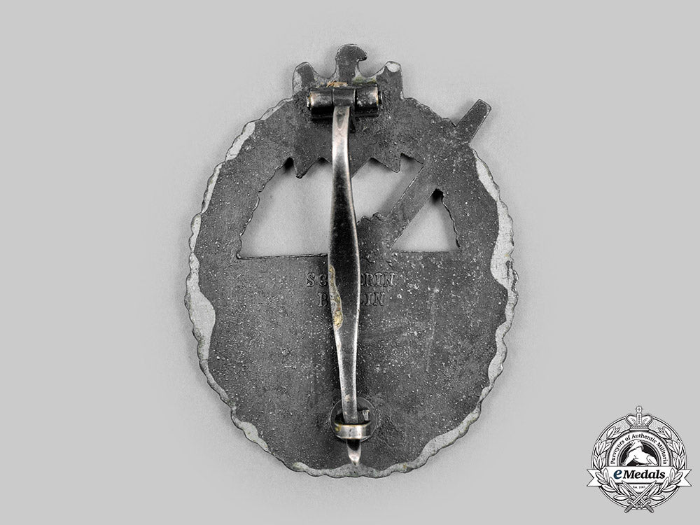 germany,_kriegsmarine._a_coastal_artillery_war_badge_by_schwerin&_sohn_c20289_mnc5523