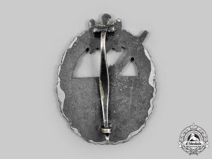 germany,_kriegsmarine._a_coastal_artillery_war_badge_by_schwerin&_sohn_c20289_mnc5523