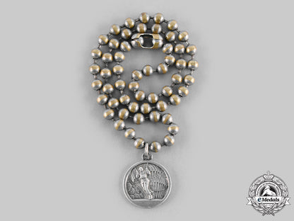 united_states._a_parachutist's"_lucky_charm"_medallion,_c.1944_c20343_emd2539_1_1