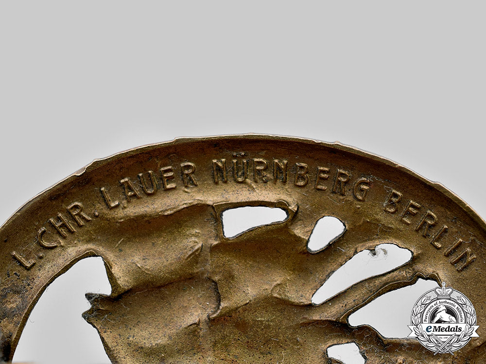 germany,_third_reich._a_german_driver’s_badge,_iii_class_in_bronze,_by_l._christian_lauer_c20427_mnc8628_1