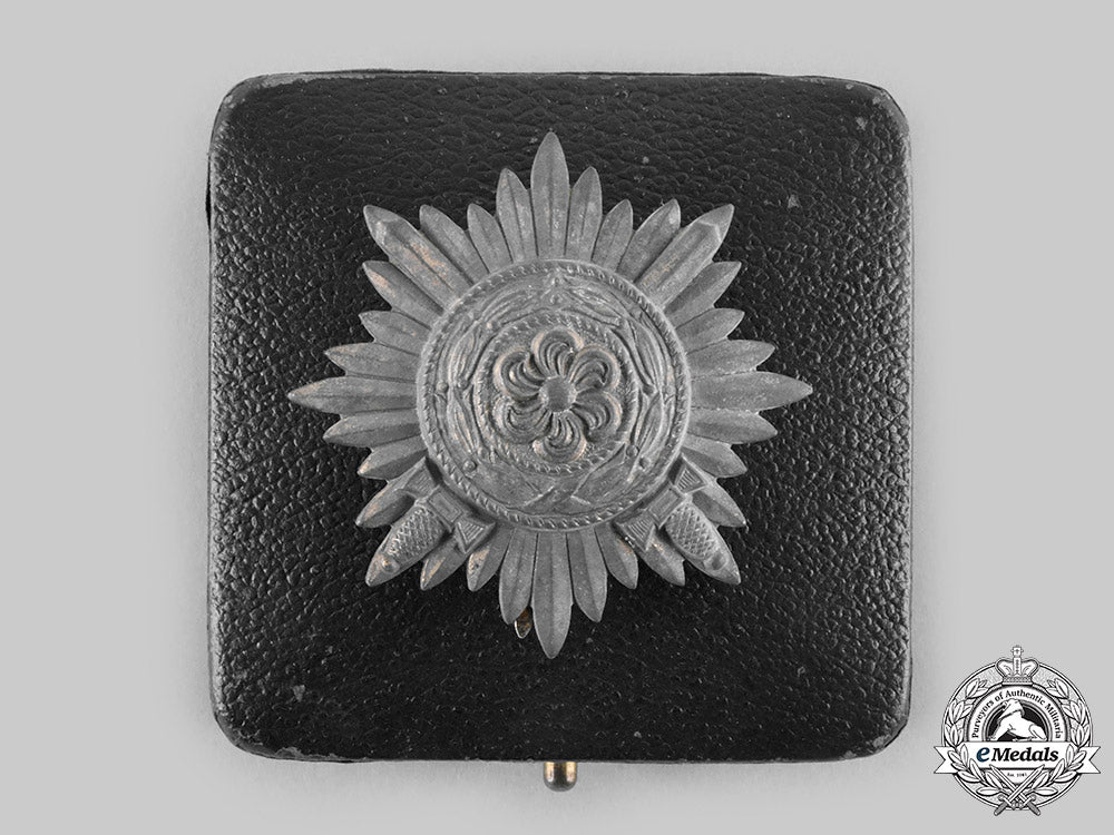 germany,_wehrmacht._an_eastern_people’s_medal,_i_class_in_gold_with_swords_and_case,_by_wächtler&_lange_c20536_emd3642_1_1_1