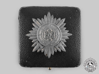 germany,_wehrmacht._an_eastern_people’s_medal,_i_class_in_gold_with_swords_and_case,_by_wächtler&_lange_c20536_emd3642_1_1_1