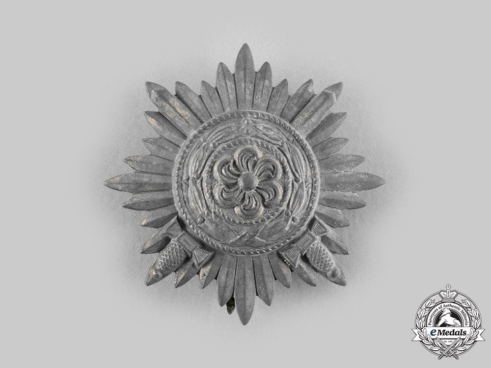 germany,_wehrmacht._an_eastern_people’s_medal,_i_class_in_gold_with_swords_and_case,_by_wächtler&_lange_c20537_emd3646_1_1_1