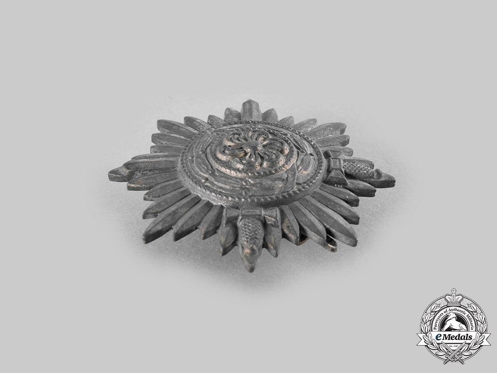 germany,_wehrmacht._an_eastern_people’s_medal,_i_class_in_gold_with_swords_and_case,_by_wächtler&_lange_c20539_emd3652_1_1_1