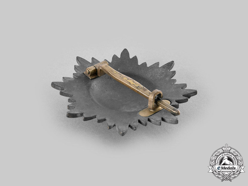 germany,_wehrmacht._an_eastern_people’s_medal,_i_class_in_gold_with_swords_and_case,_by_wächtler&_lange_c20540_emd3651_1_1_1