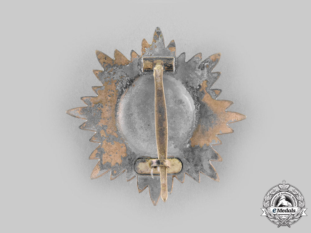 germany,_wehrmacht._an_eastern_people’s_medal,_i_class_in_gold_with_swords_and_case,_by_wächtler&_lange_c20681_emd4427_1