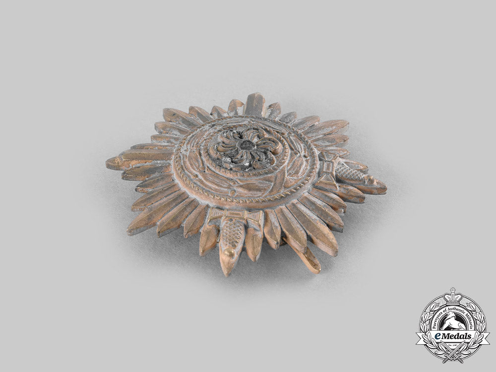 germany,_wehrmacht._an_eastern_people’s_medal,_i_class_in_gold_with_swords_and_case,_by_wächtler&_lange_c20682_emd4431_1