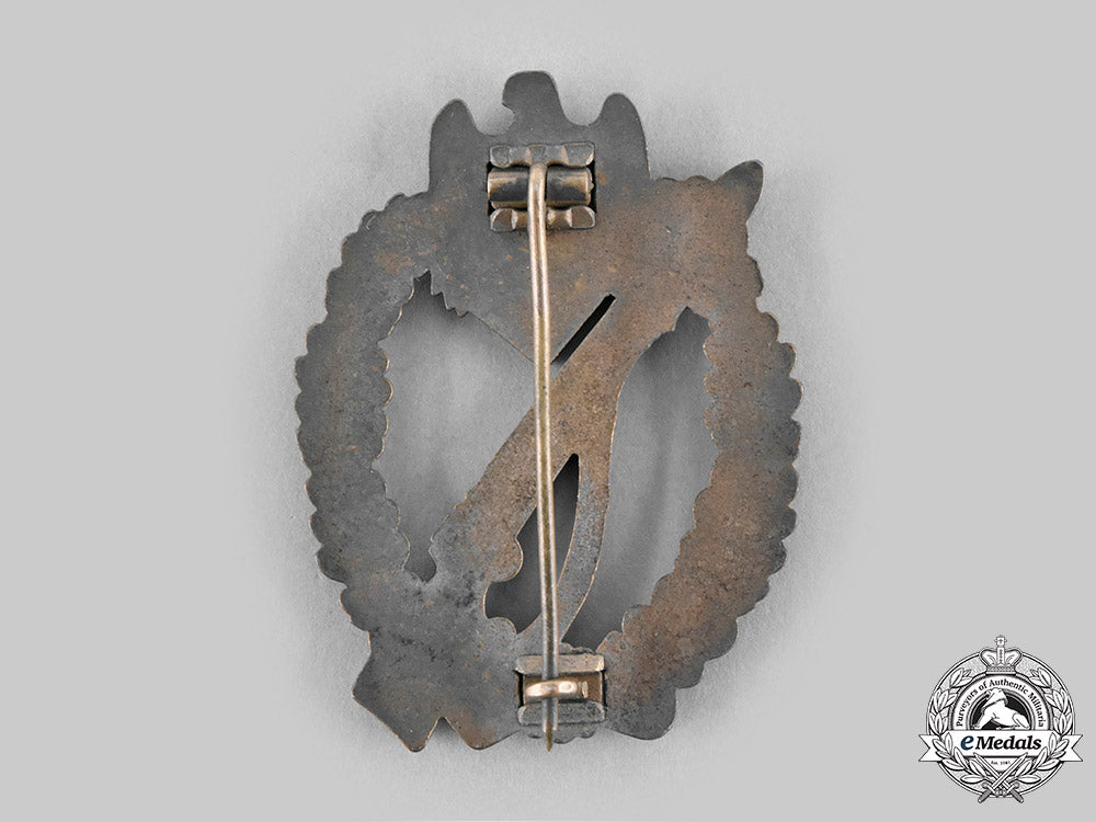 germany,_wehrmacht._an_infantry_assault_badge,_bronze_grade,_by_gottlieb&_wagner_c20912_emd1076