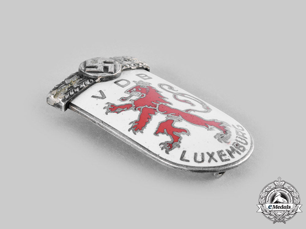 germany,_third_reich._a_volksdeutsche_bewegung_luxemburg_honour_badge_c20937_emd9168_1