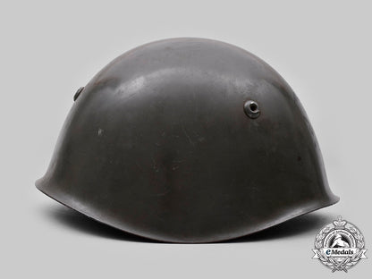 italy,_kingdom._an_alpini_m33_steel_helmet,_c.1936_issue_c20961_mnc6547_1