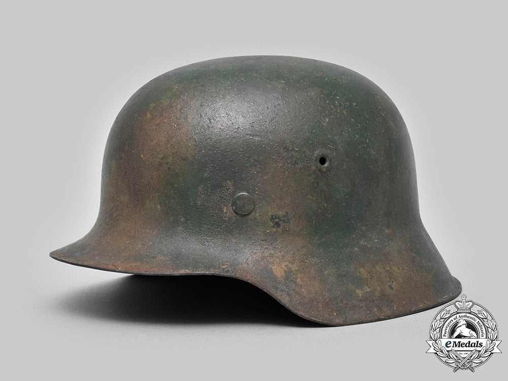 germany,_heer._an_m42_steel_camouflage_helmet_c20_01428_c20_01469