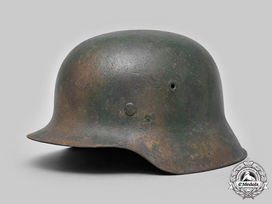 germany,_heer._an_m42_steel_camouflage_helmet_c20_01428_c20_01469