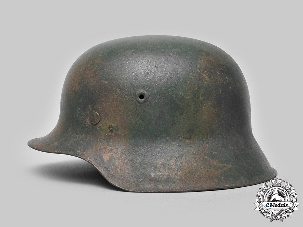 germany,_heer._an_m42_steel_camouflage_helmet_c20_01429_c20_01473