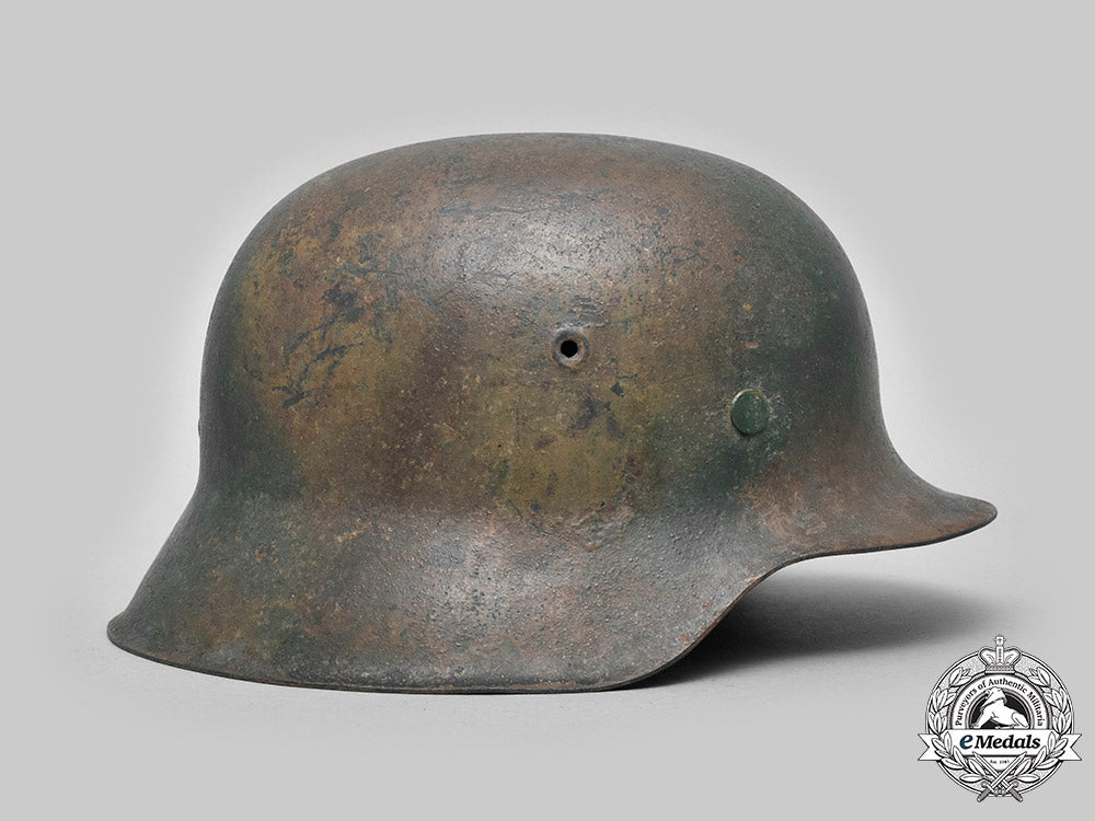 germany,_heer._an_m42_steel_camouflage_helmet_c20_01431_c20_01471