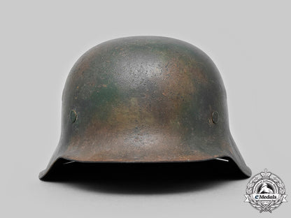 germany,_heer._an_m42_steel_camouflage_helmet_c20_01432_c20_01470