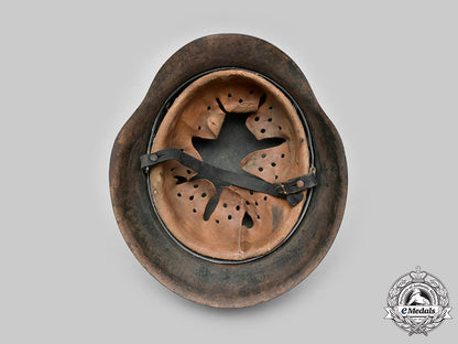 germany,_heer._an_m42_steel_camouflage_helmet_c20_01433_c20_01474