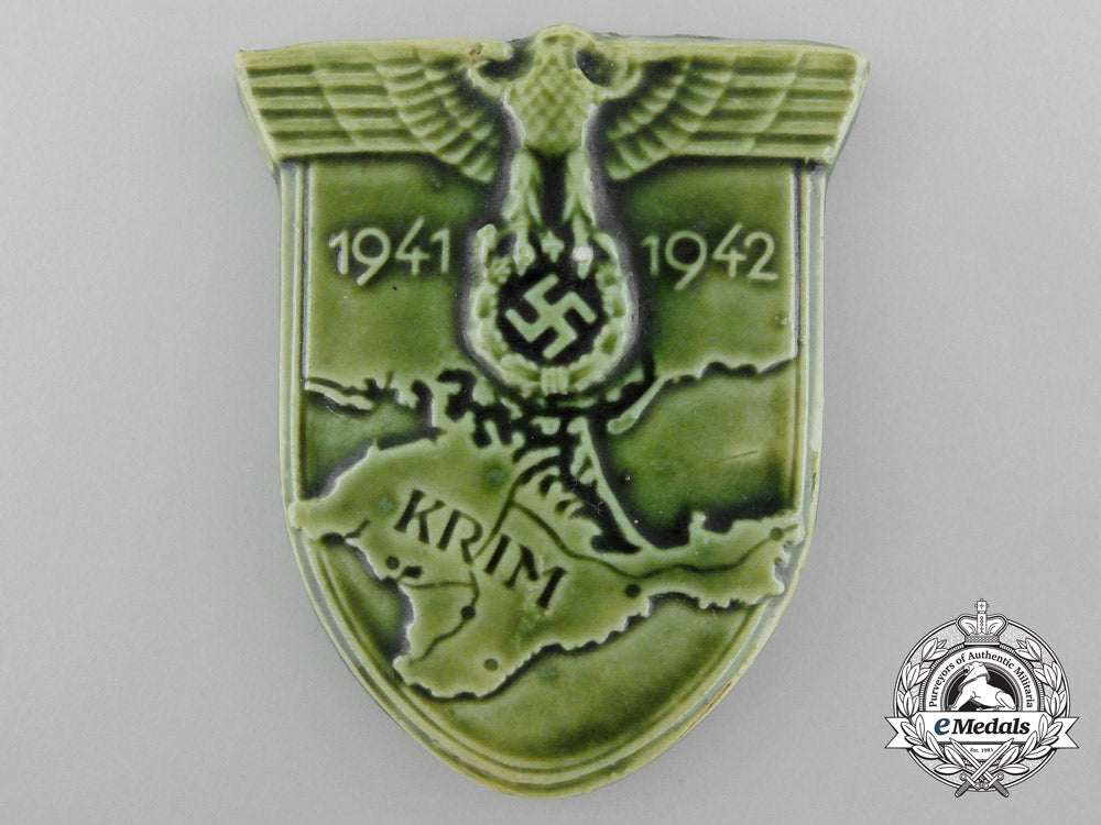 an_unusual_krim_campaign_shield_in_green_porcelain_c_1884
