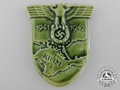 An Unusual Krim Campaign Shield In Green Porcelain