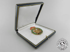 A Brunei Officer’s Meritorious Service Badge In 18Kt Gold