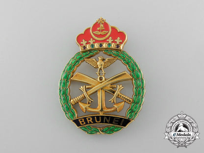 a_brunei_officer’s_meritorious_service_badge_in18_kt_gold_c_2802