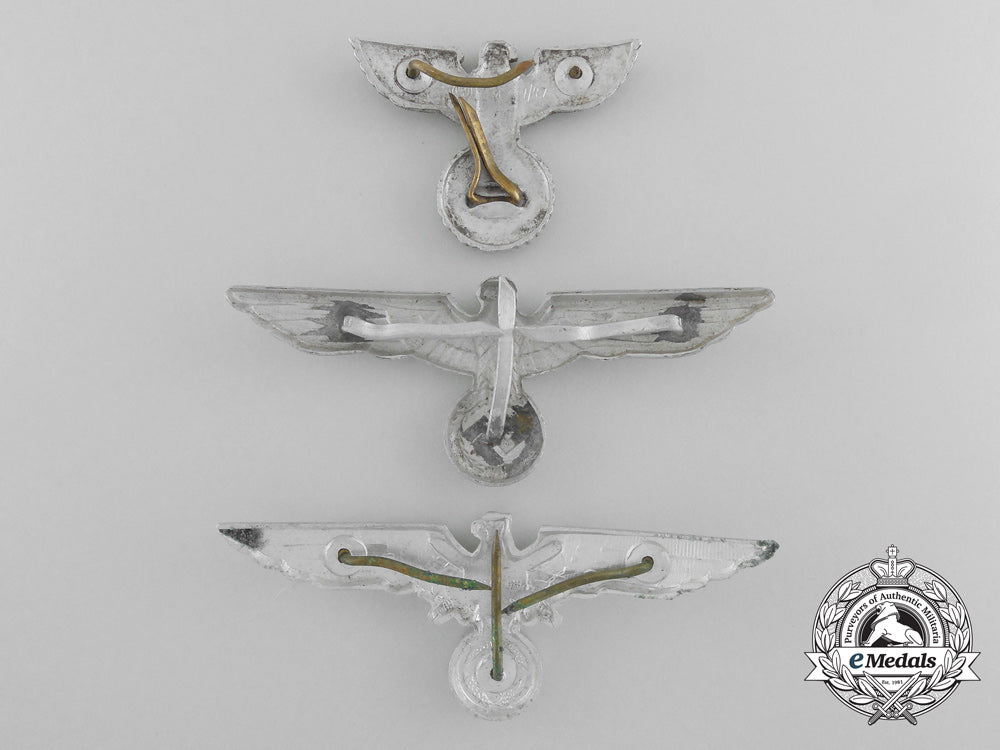 a_lot_of_three_german_eagle_cap_badges_c_3076
