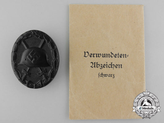 a_mint_black_grade_wound_badge_with_packet_by_hauptmünzamt,_wien_c_3473