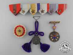 Four Second War Period Japanese Badges & Insignia