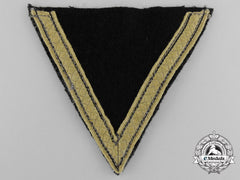 An Ss Sturmmann (Gefreiter) Tropical Rank Chevron