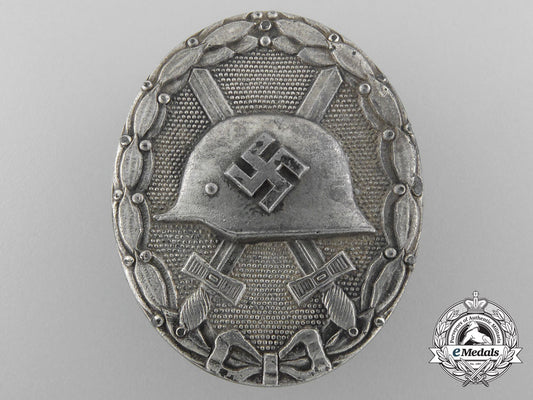 a_german_second_war_silver_grade_wound_badge_by_carl_wild_c_4147